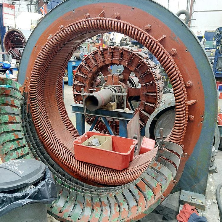 Compressor motor in Duke Electric shop for repair